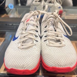 White and Red Athletic Shoes